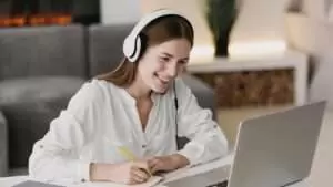 Teacher talking with her students online